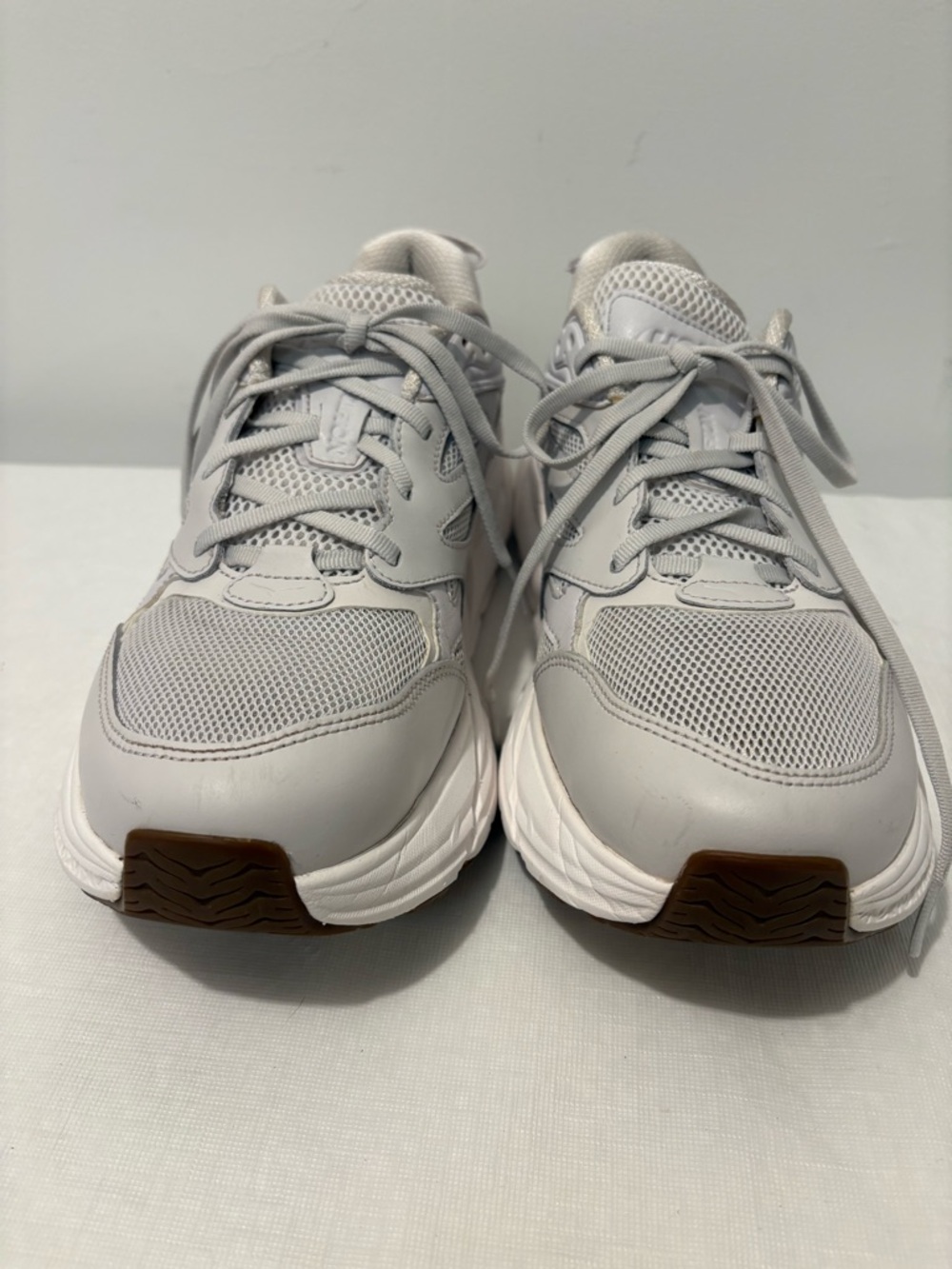 Hoka One One Gray and Blue Athletic Shoe Label Detail